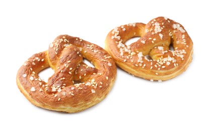 Photo of Tasty pretzels with salt isolated on white