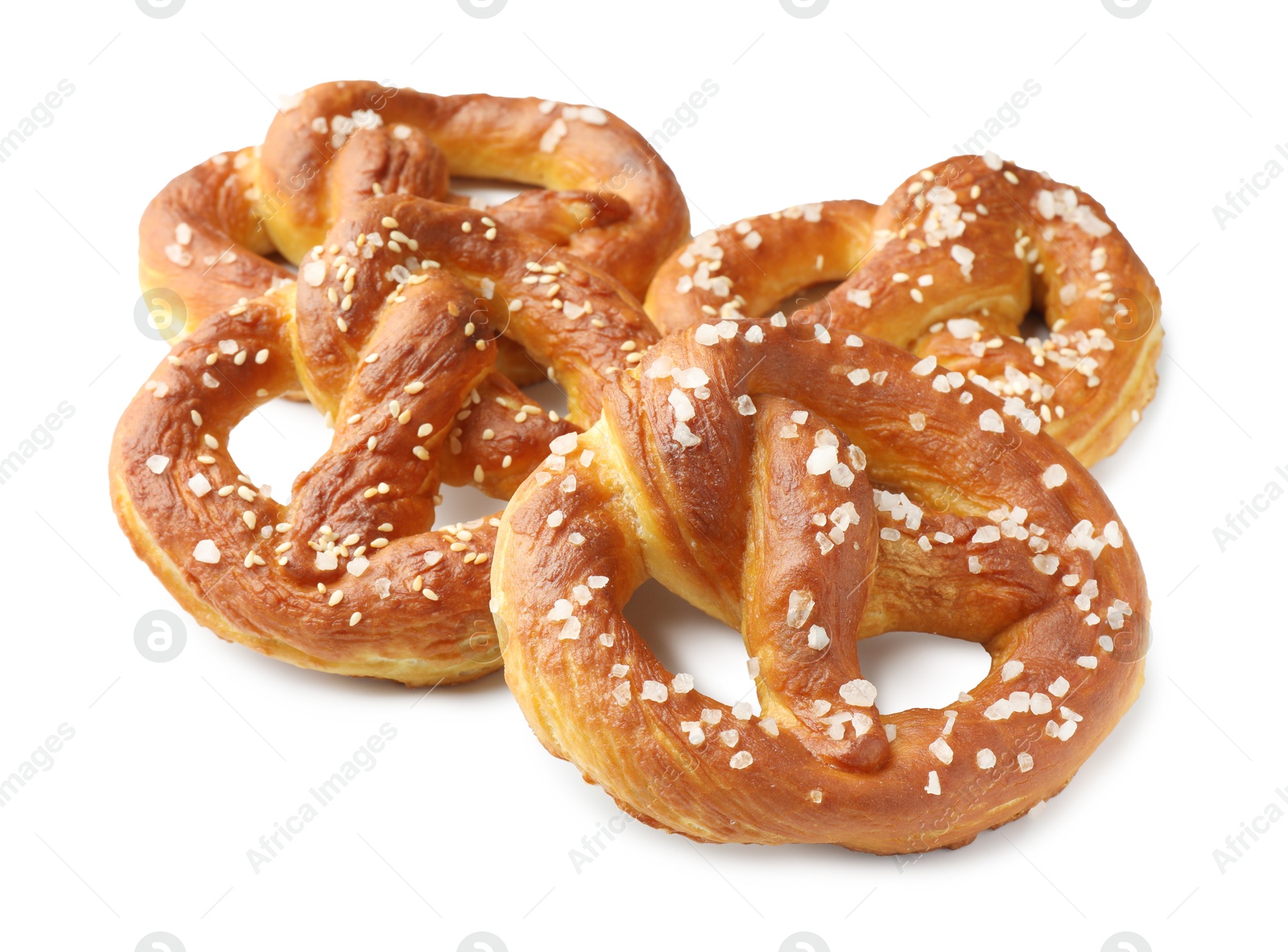 Tasty pretzels with salt isolated on white Photo of Tasty pretzels with salt isolated on white