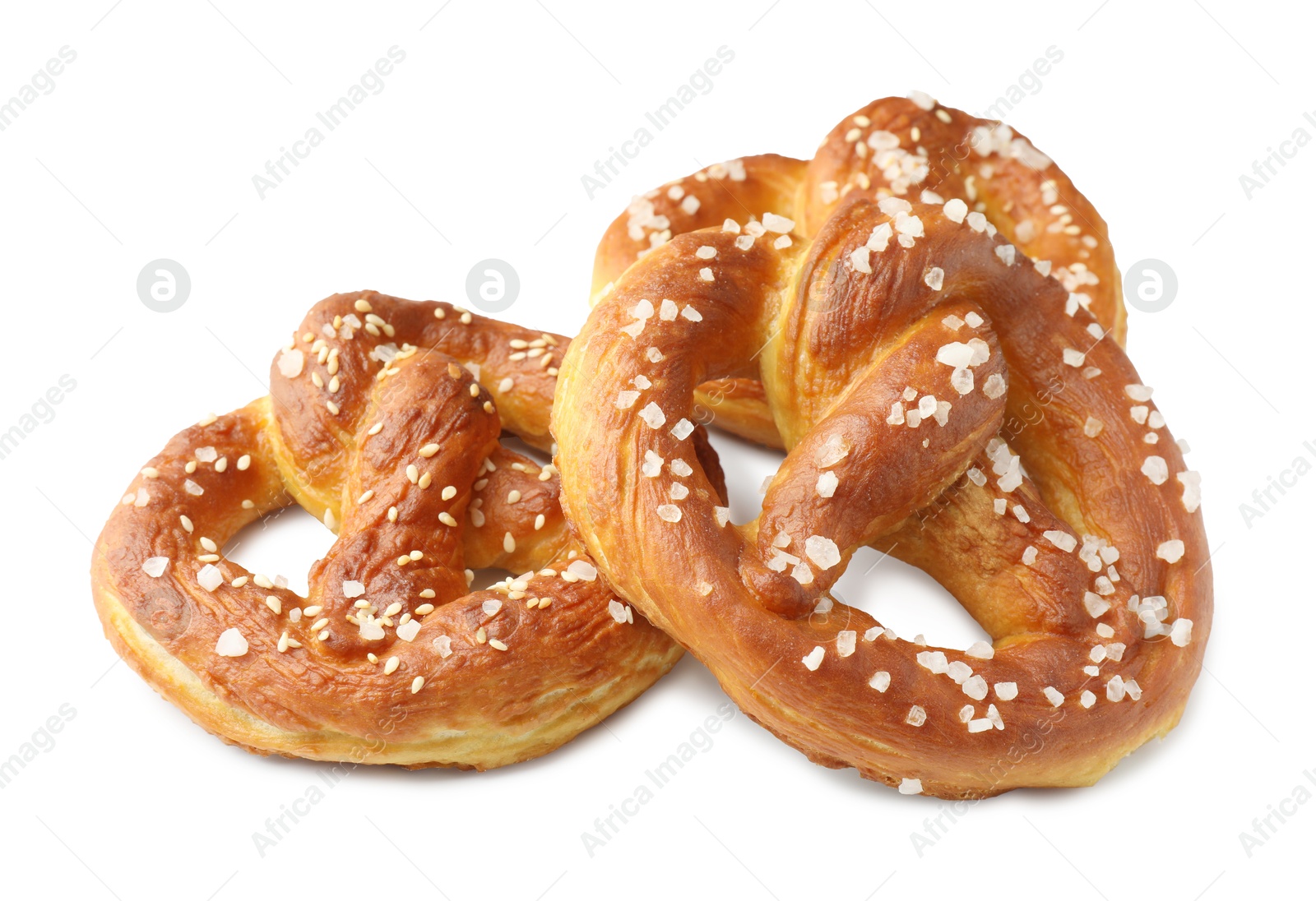 Tasty pretzels with salt isolated on white Photo of Tasty pretzels with salt isolated on white