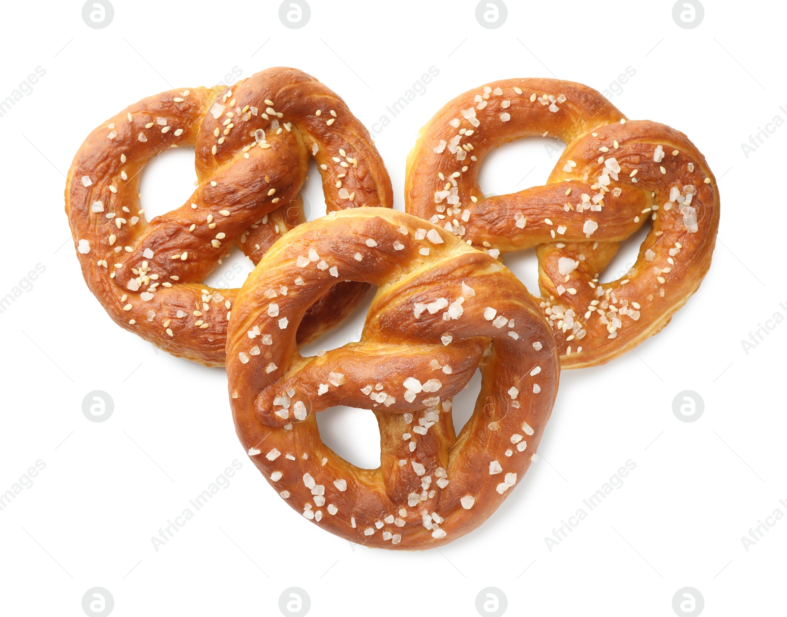 Tasty pretzels with salt isolated on white, top view Photo of Tasty pretzels with salt isolated on white, top view