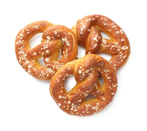 Photo of Tasty pretzels with salt isolated on white, top view