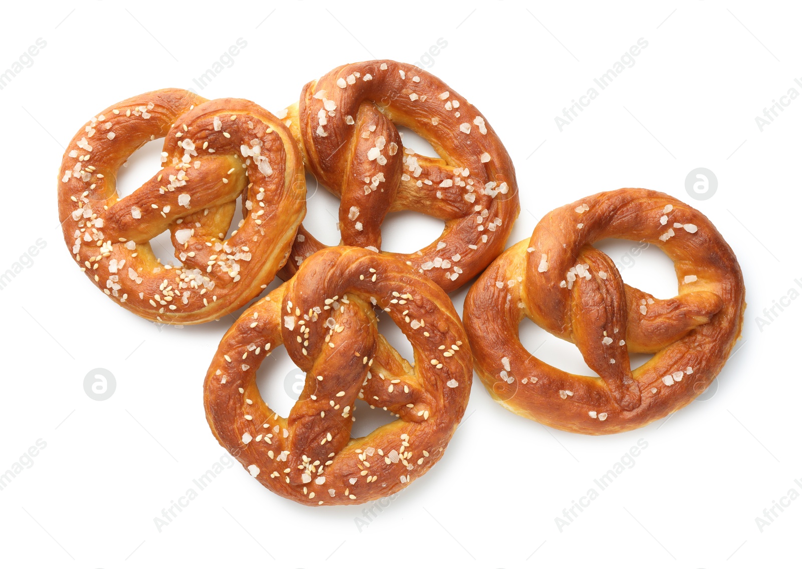 Tasty pretzels with salt isolated on white, top view Photo of Tasty pretzels with salt isolated on white, top view