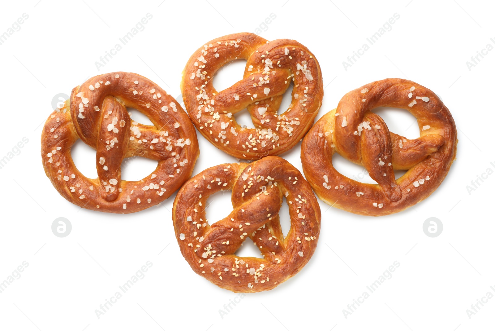 Tasty pretzels with salt isolated on white, top view Photo of Tasty pretzels with salt isolated on white, top view