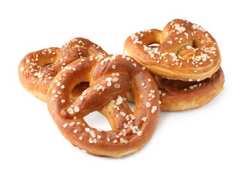 Photo of Tasty pretzels with salt isolated on white