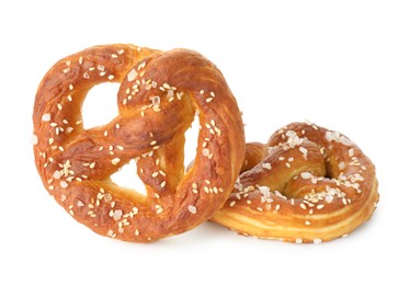 Photo of Tasty pretzels with salt isolated on white
