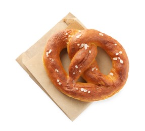 Photo of Tasty pretzel with salt isolated on white, top view