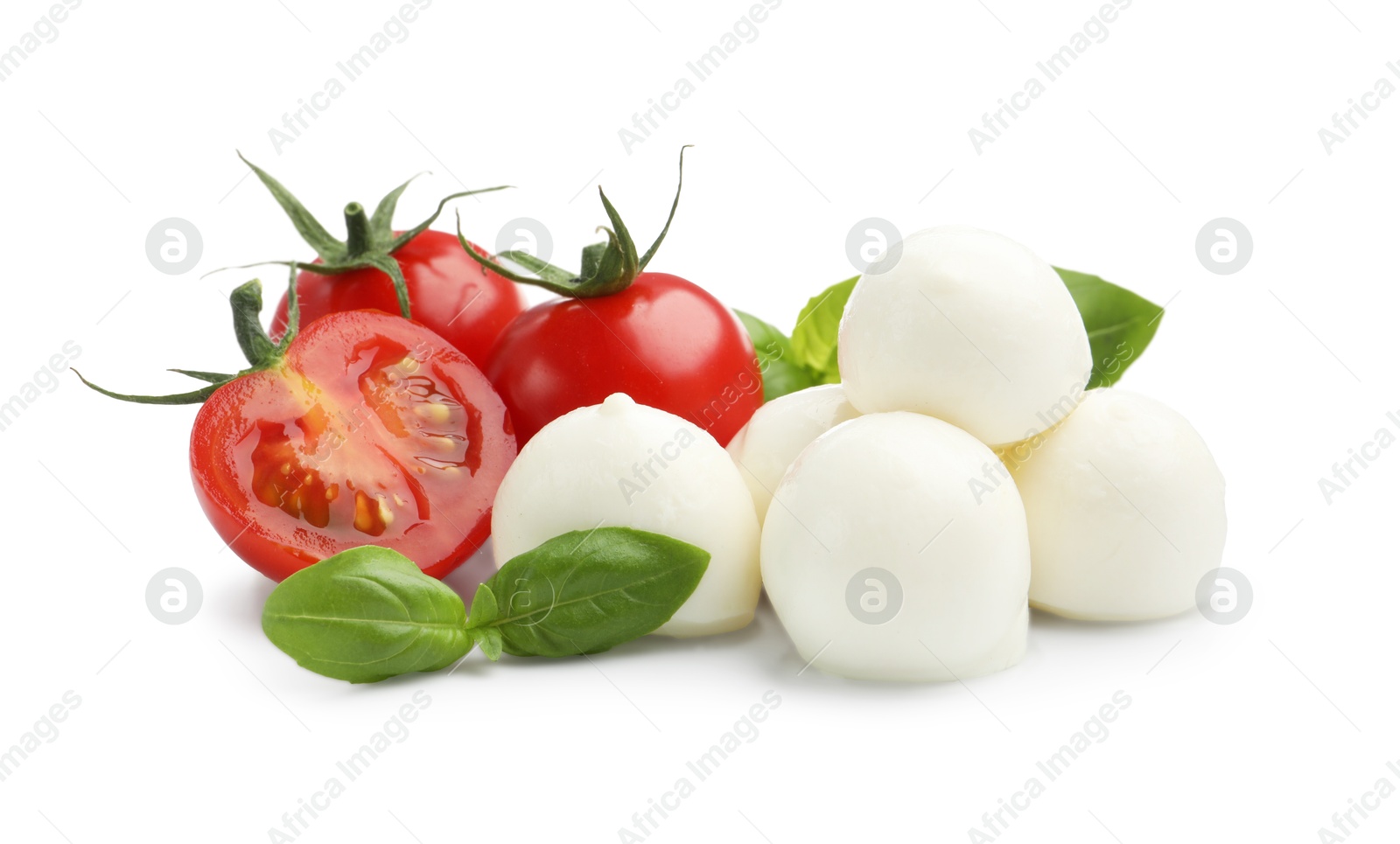 Tasty mozzarella cheese balls, tomatoes and basil isolated on white Photo of Tasty mozzarella cheese balls, tomatoes and basil isolated on white