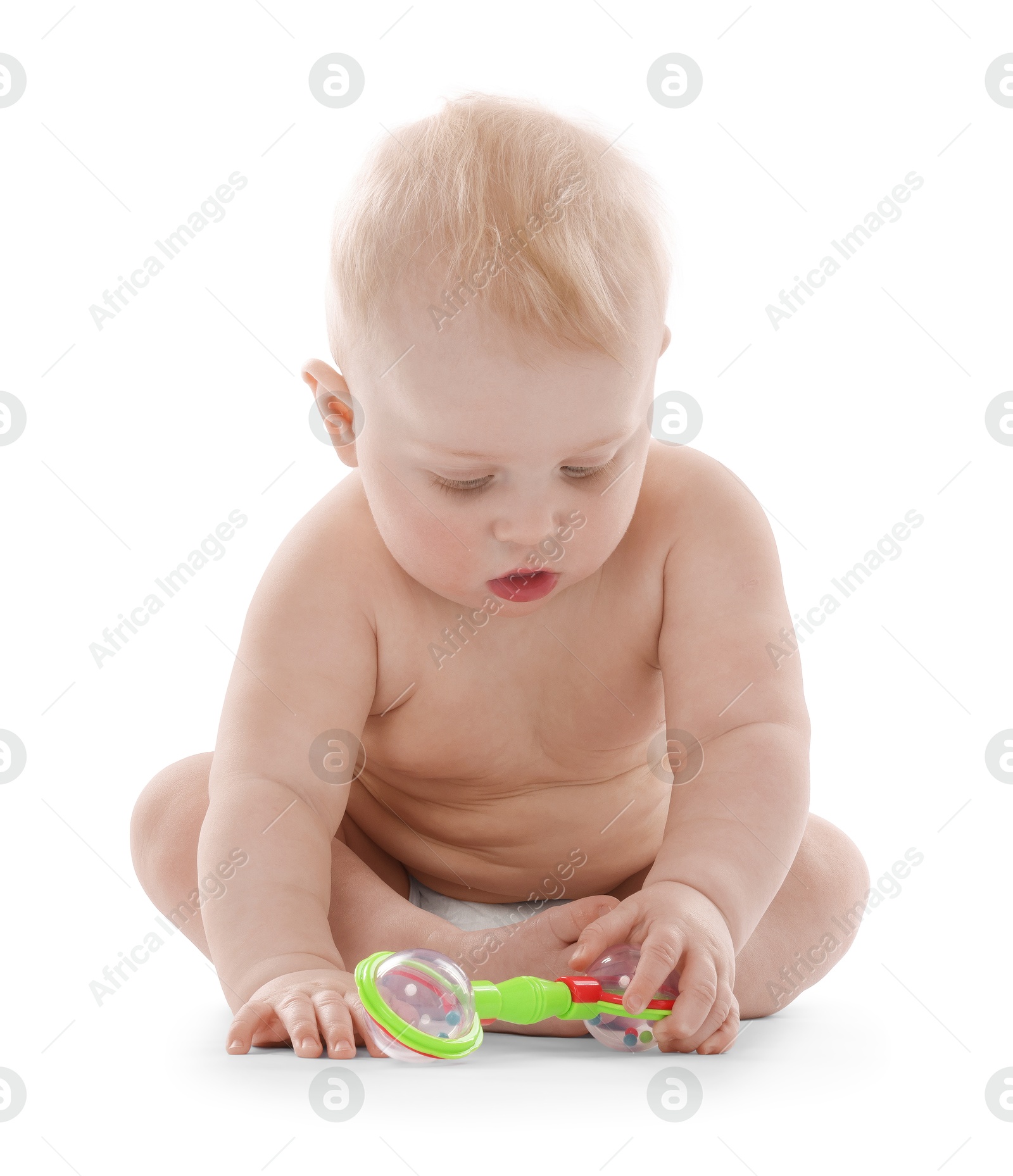 Cute little baby with rattle on white background Photo of Cute little baby with rattle on white background