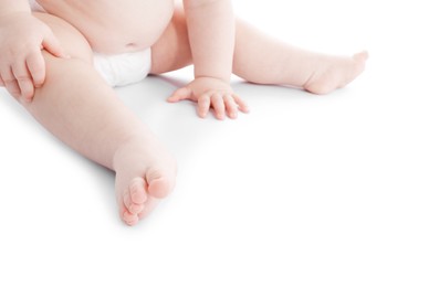 Photo of Cute little baby in diaper on white background, closeup