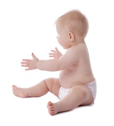 Photo of Cute little baby in diaper on white background