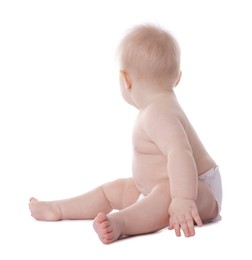 Photo of Cute little baby in diaper on white background