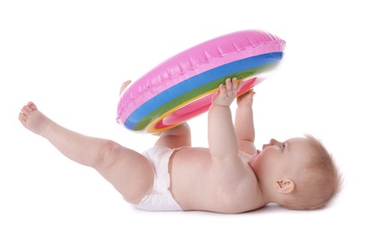 Photo of Cute little baby with inflatable ring on white background