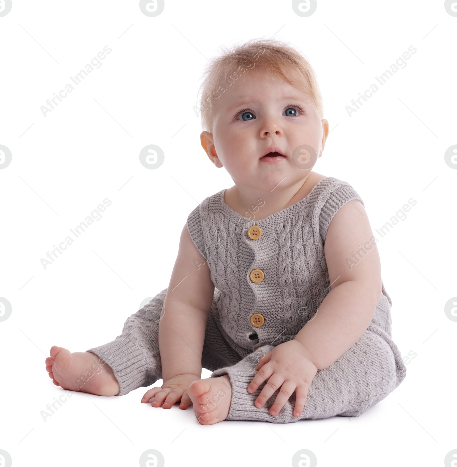 Photo of Cute little baby in knitted romper on white background