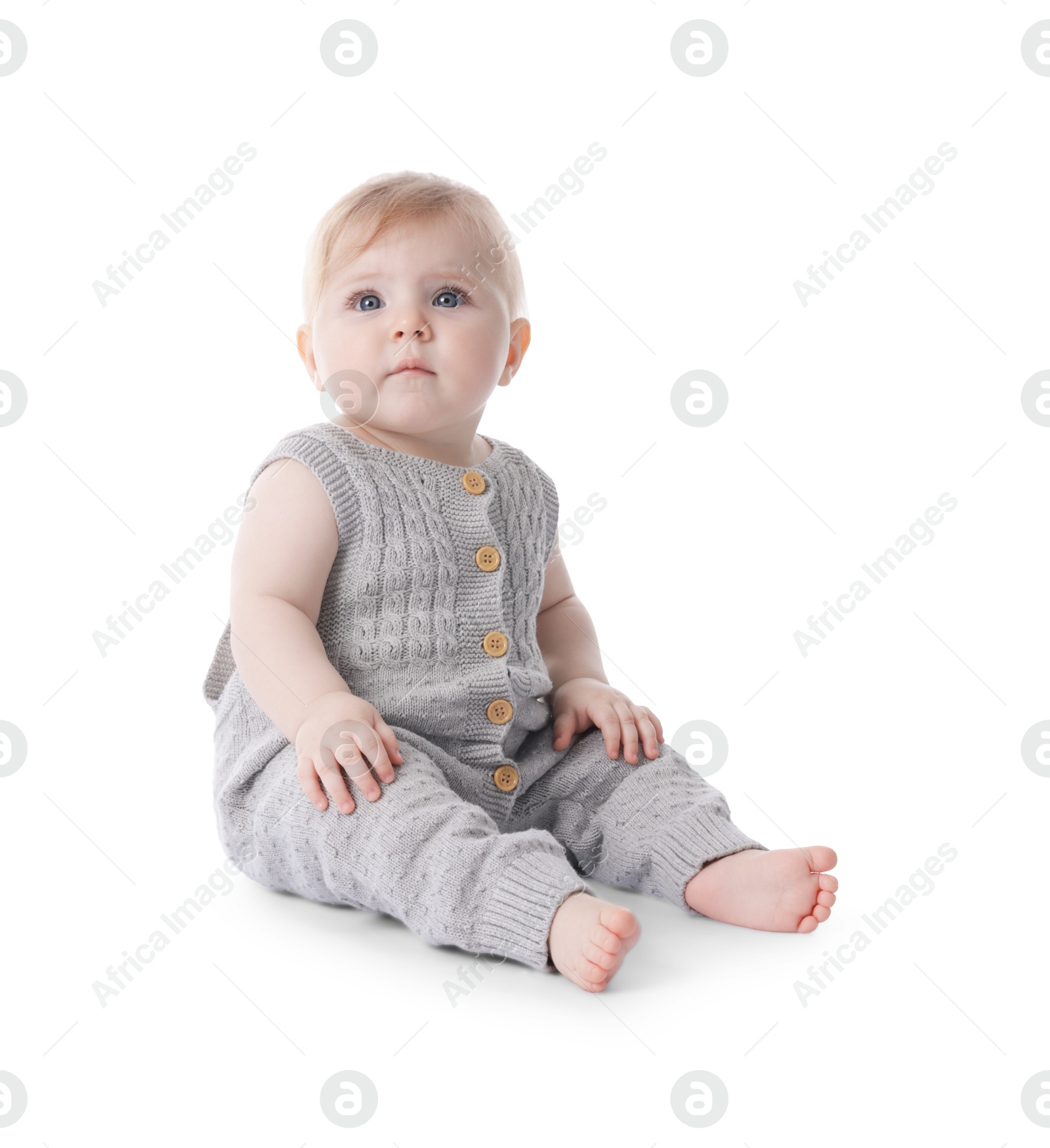 Photo of Cute little baby in knitted romper on white background