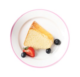 Photo of Piece of tasty bundt cake with berries isolated on white, top view