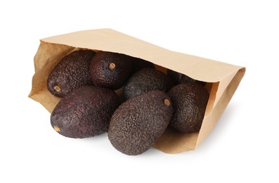 Photo of Ripe avocado fruits in paper package isolated on white