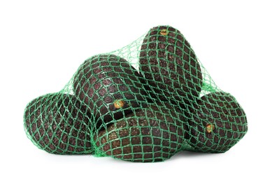 Photo of Ripe avocado fruits in net bag isolated on white