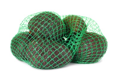 Photo of Ripe avocado fruits in net bag isolated on white