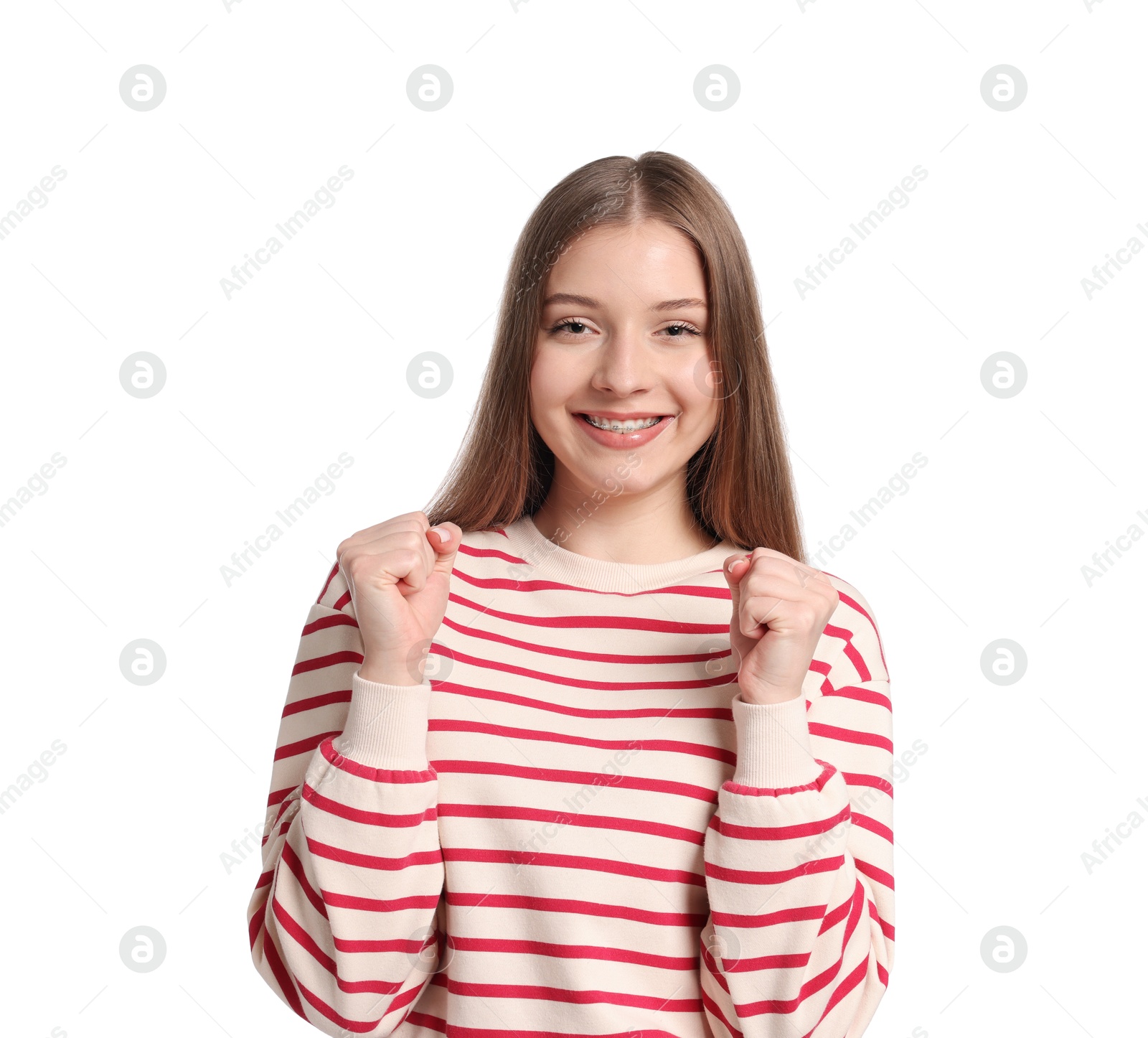 Portrait of excited teenage girl on white background Photo of Portrait of excited teenage girl on white background