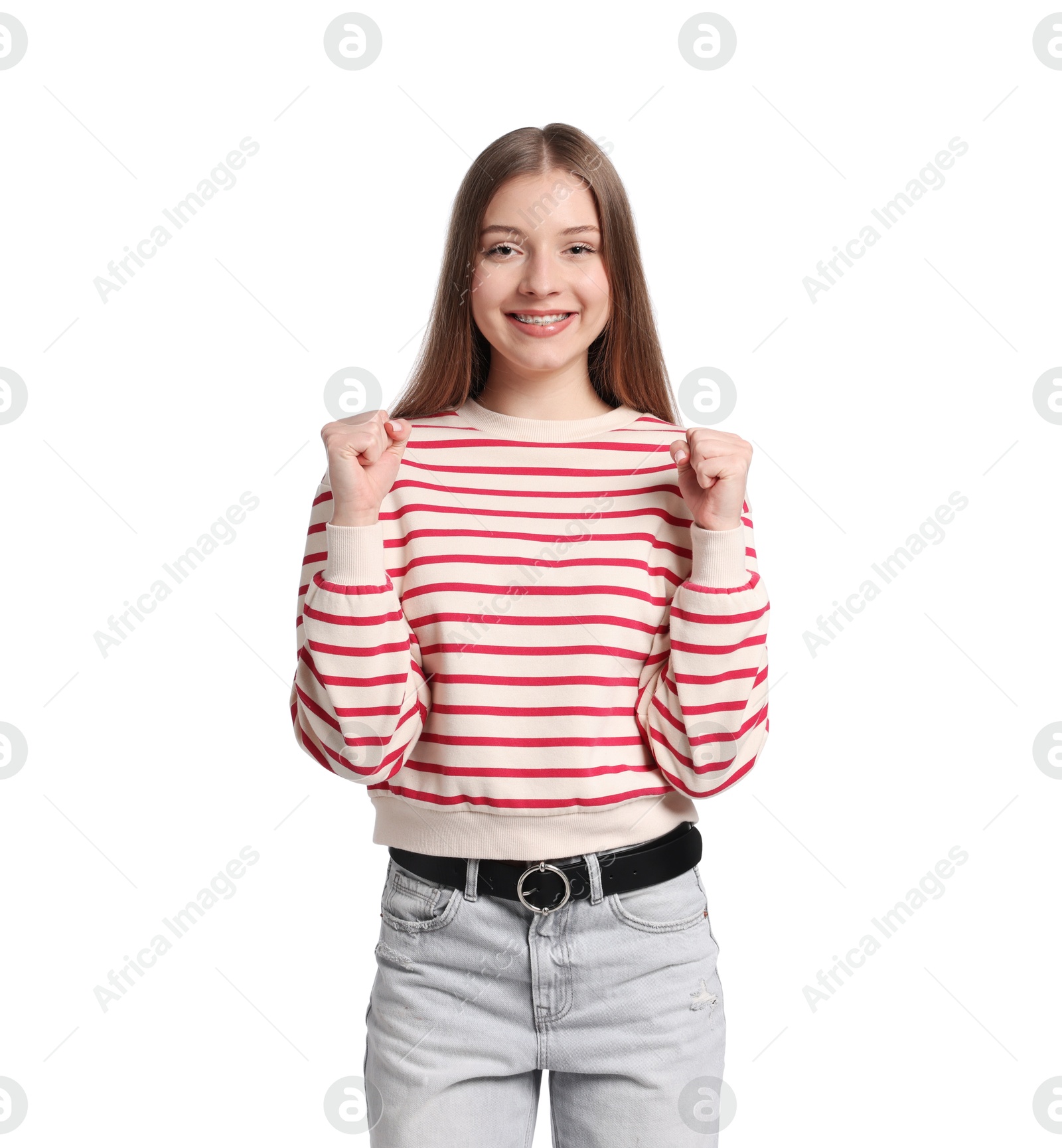 Portrait of excited teenage girl on white background Photo of Portrait of excited teenage girl on white background