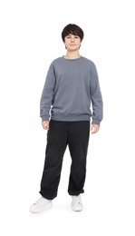 Photo of Portrait of teenage boy on white background