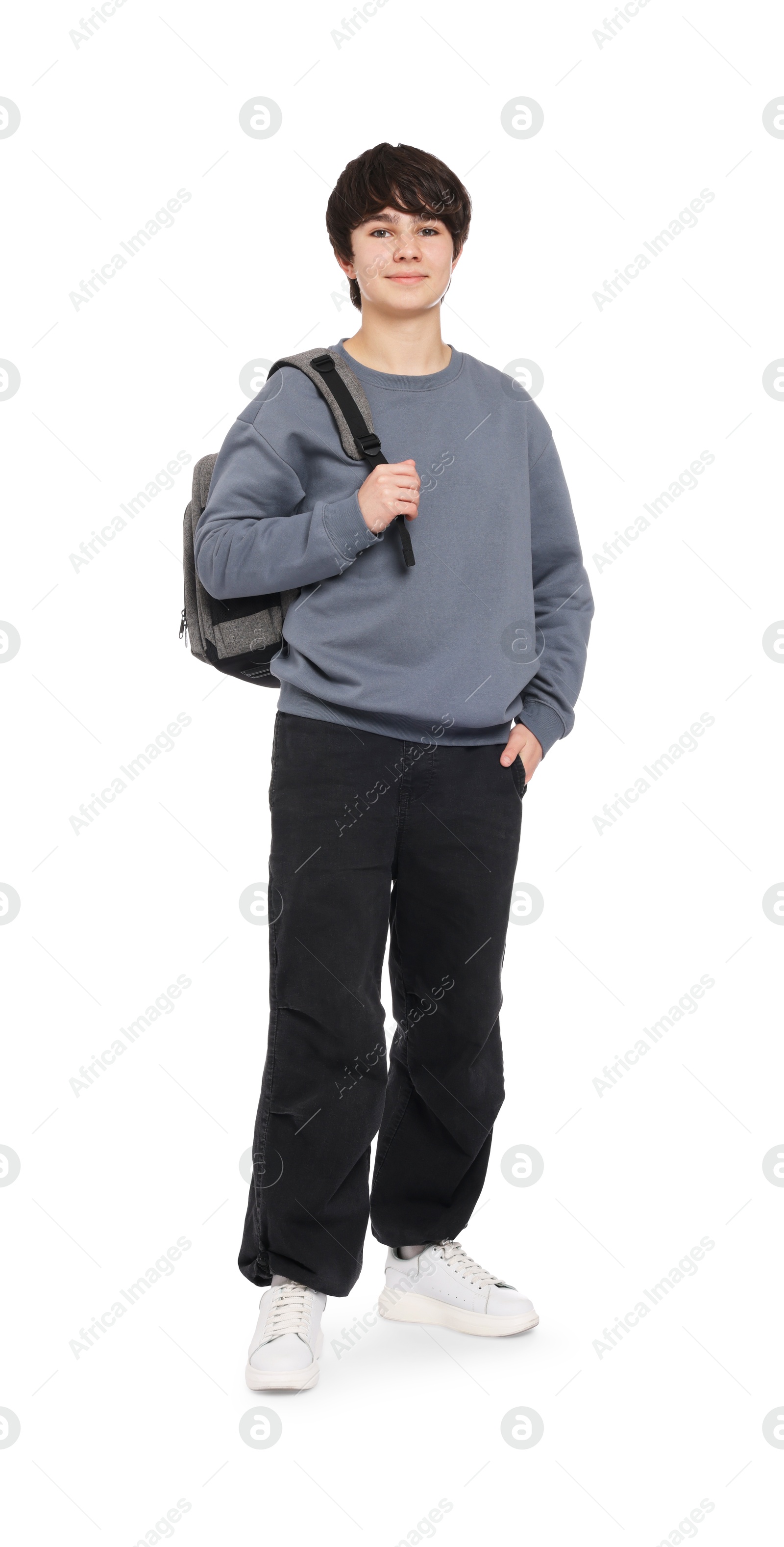 Portrait of teenage boy with backpack on white background Photo of Portrait of teenage boy with backpack on white background