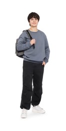 Photo of Portrait of teenage boy with backpack on white background