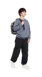 Photo of Portrait of teenage boy with backpack on white background