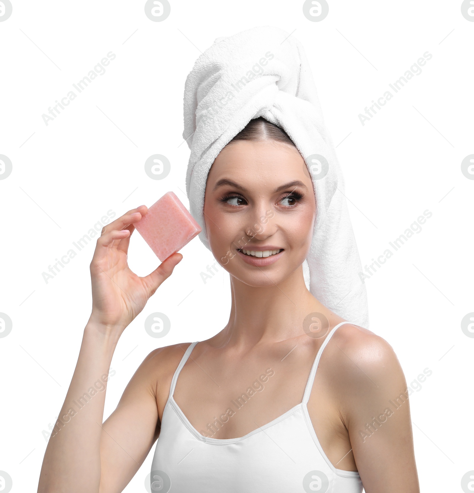 Smiling woman with soap bar on white background Photo of Smiling woman with soap bar on white background