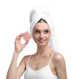 Photo of Smiling woman with soap bar on white background
