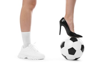 Photo of Woman in high heeled shoe and sneaker with soccer ball on white background, closeup