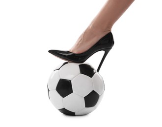 Photo of Woman in high heeled shoe with soccer ball on white background, closeup