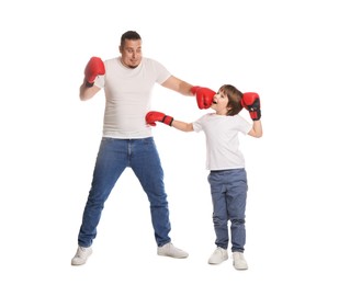Photo of Father and his son boxing on white background