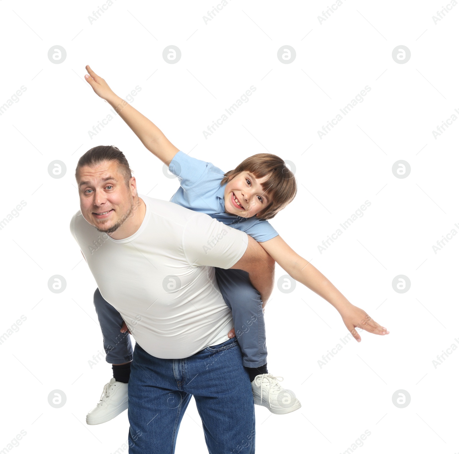 Father and his son having fun together on white background Photo of Father and his son having fun together on white background