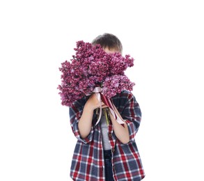 Photo of Little boy with bouquet of lilac flowers on white background