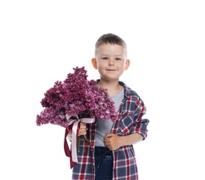 Photo of Little boy with bouquet of lilac flowers on white background