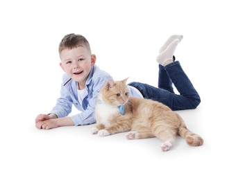 Photo of Little boy with her cute ginger cat on white background