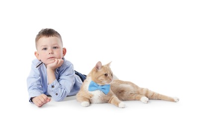 Photo of Little boy with her cute ginger cat on white background