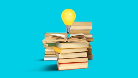 Image of Idea and knowledge. Light bulb in air over books against light blue background. Banner design
