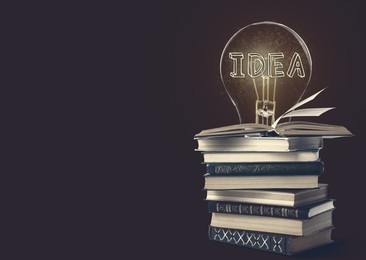 Image of Idea and knowledge. Light bulb illustration and stack of books on dark background, space for text