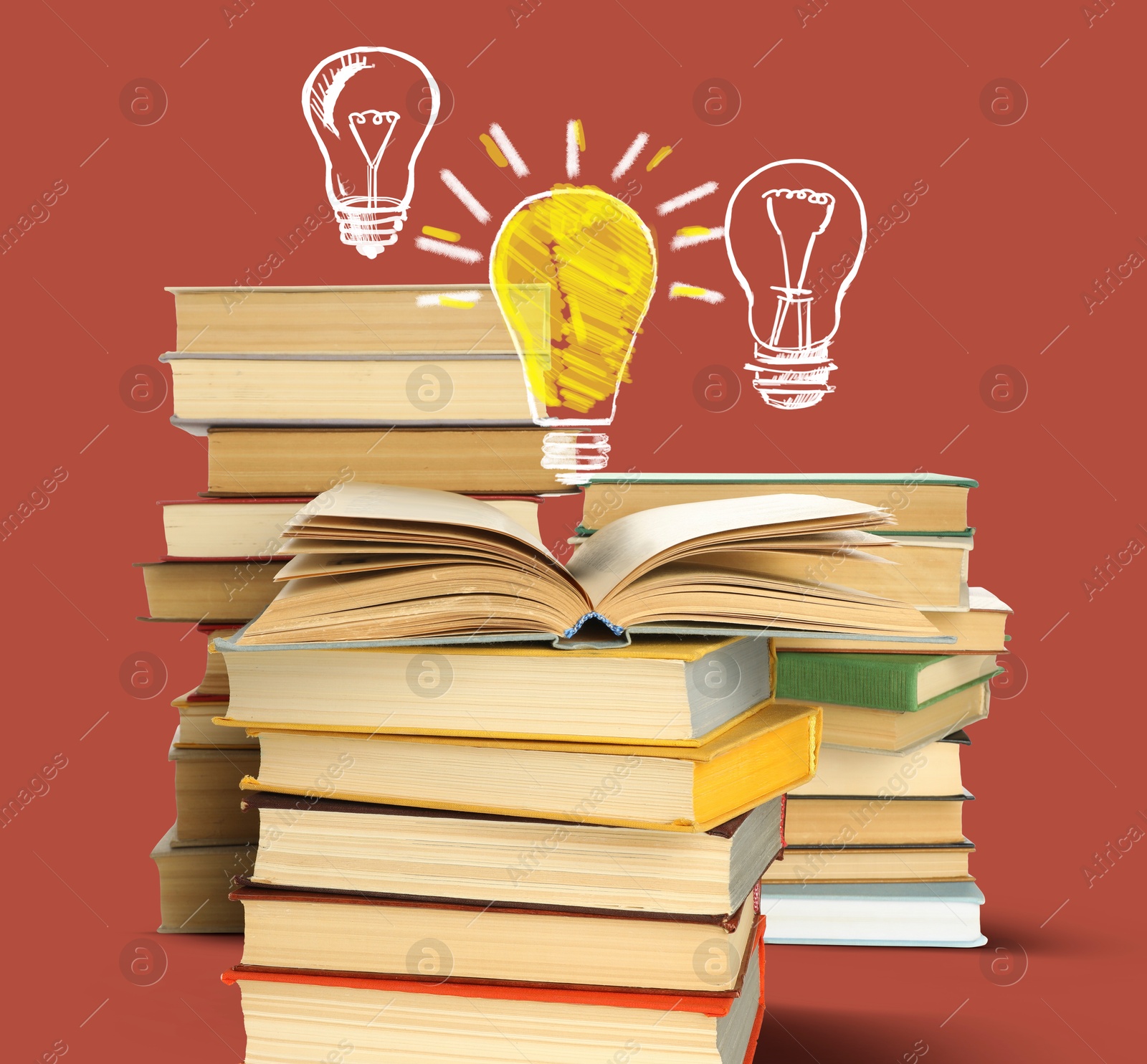 Idea and studying. Light bulb illustrations and books on brown background Image of Idea and studying. Light bulb illustrations and books on brown background