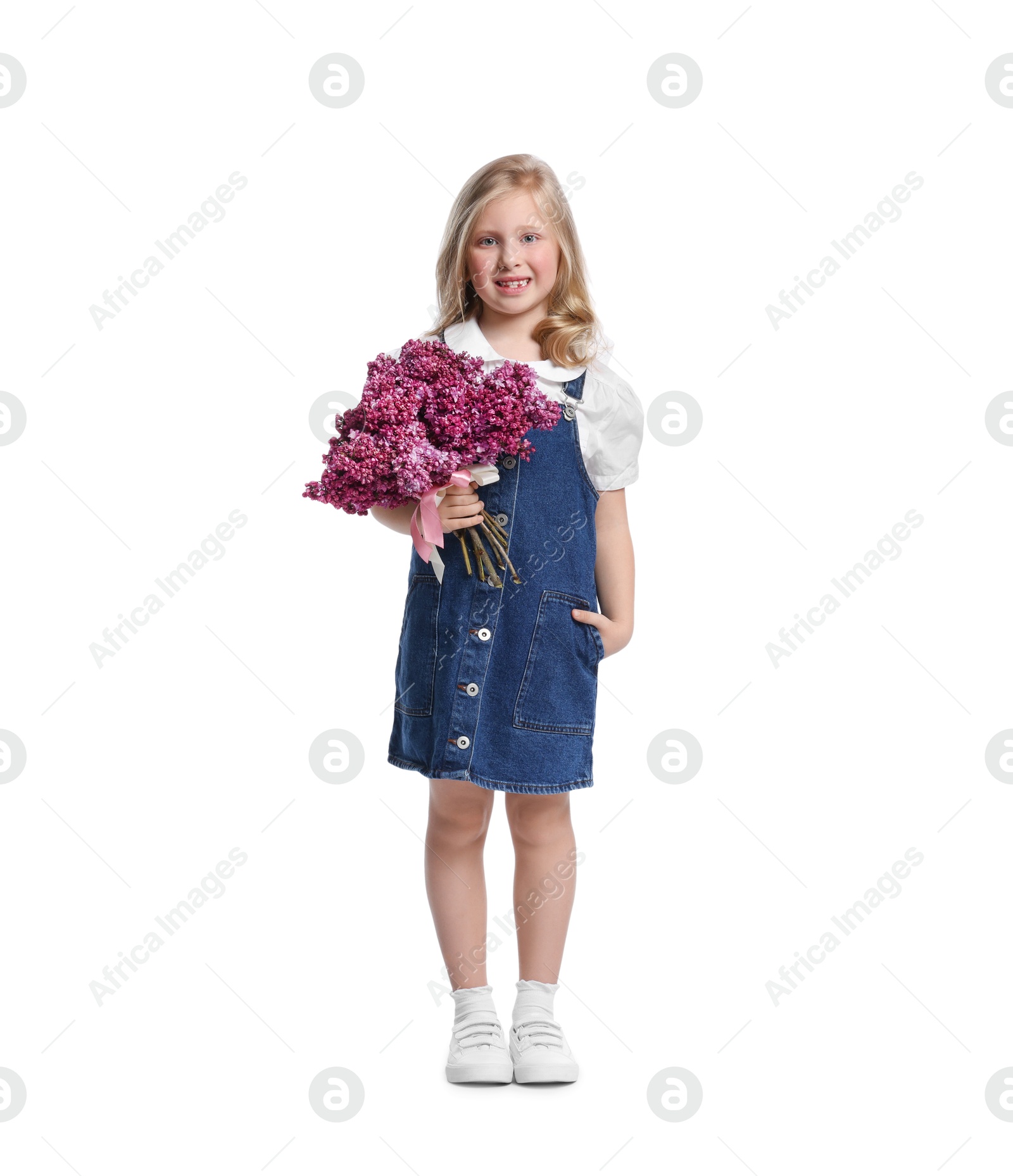 Little girl with bouquet of lilac flowers on white background Photo of Little girl with bouquet of lilac flowers on white background