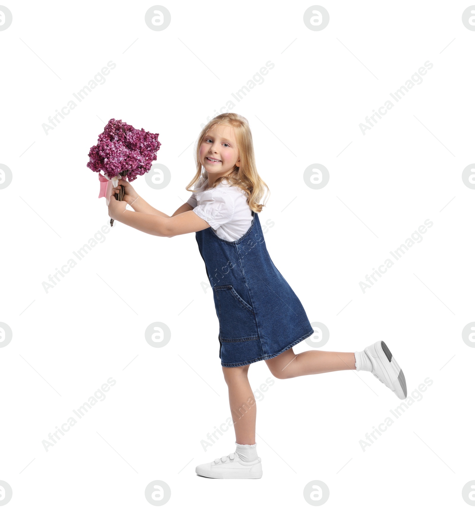 Little girl with bouquet of lilac flowers on white background Photo of Little girl with bouquet of lilac flowers on white background