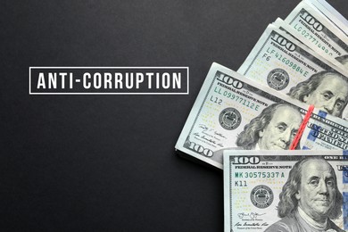 Image of Anti-Corruption. Dollar bills on dark background, top view