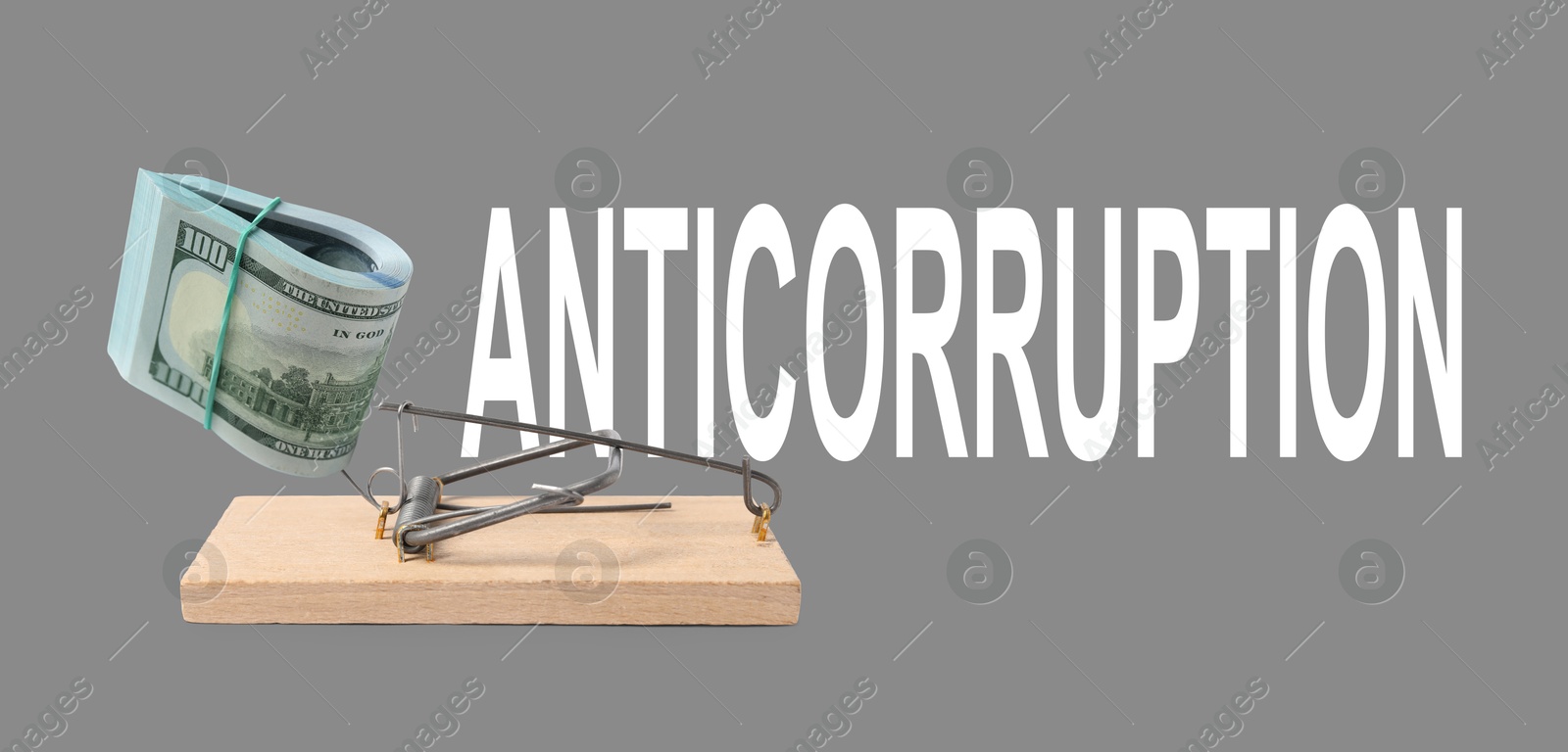 Anti-Corruption. Dollar bills as bait on mousetrap against grey background. Banner design Image of Anti-Corruption. Dollar bills as bait on mousetrap against grey background. Banner design