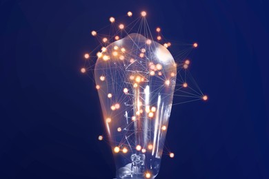 Illustration of Light bulb with pattern of connected dots on blue gradient background. Idea, creativity, innovation