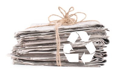 Image of Recycling symbol and stack of tied newspapers on white background. Eco-friendly lifestyle, reusing