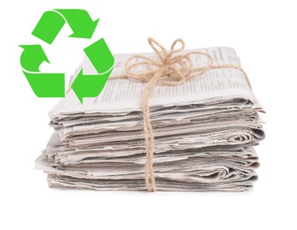 Image of Recycling symbol and stack of tied newspapers on white background. Eco-friendly lifestyle, reusing