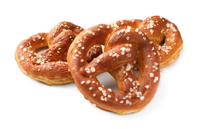 Photo of Tasty pretzels with salt isolated on white