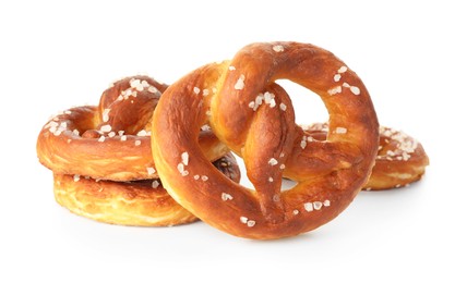 Photo of Tasty pretzels with salt isolated on white